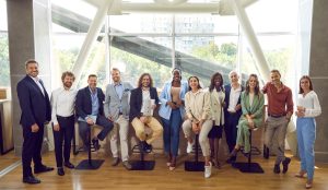 College alumni gather together during a networking event coordinated with a digital member directory